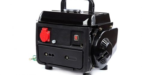 Portable fuel electric generator on white background.
